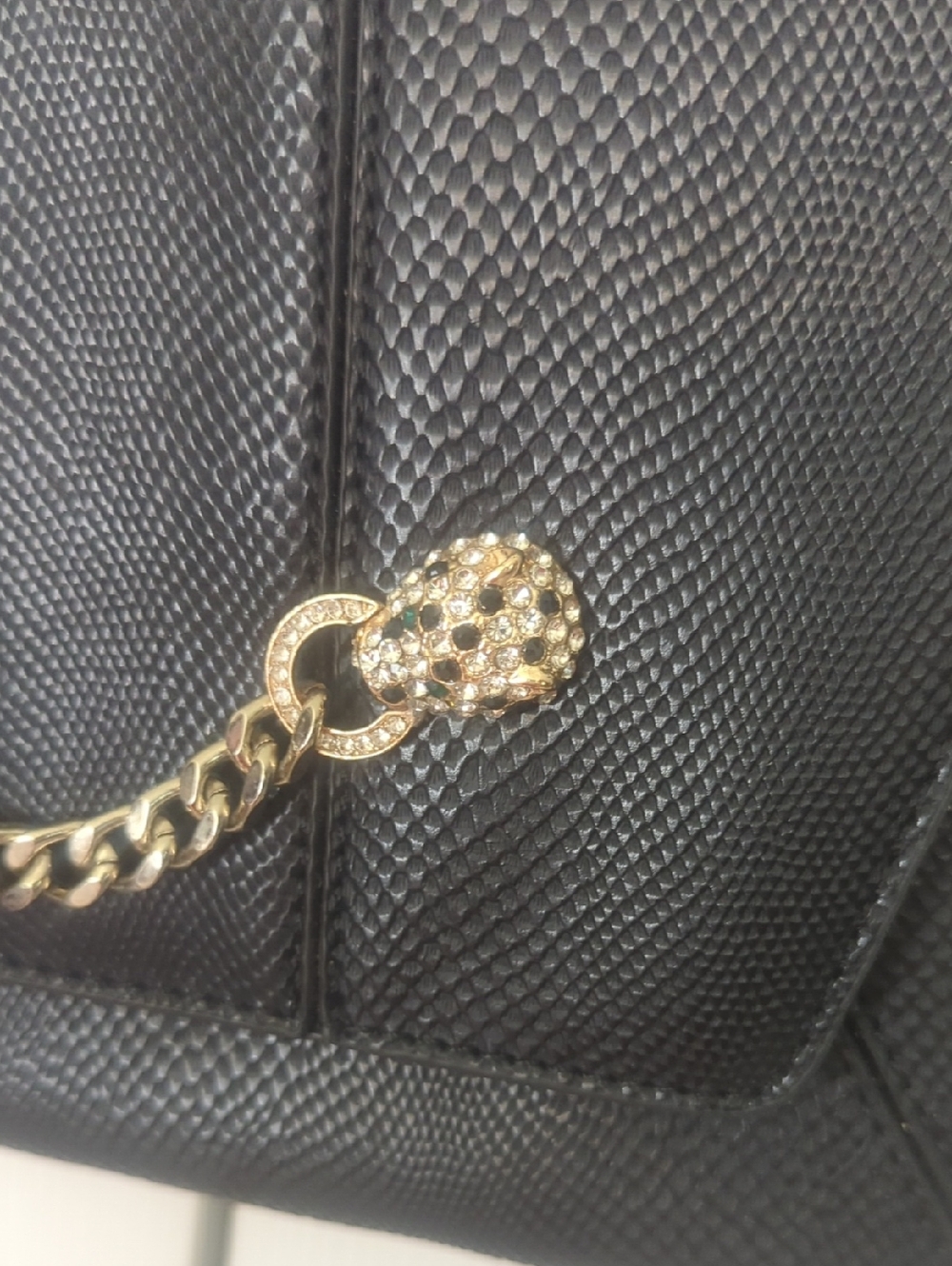 Black Textured Shoulder Bag with Gold Crystal Skull Charm